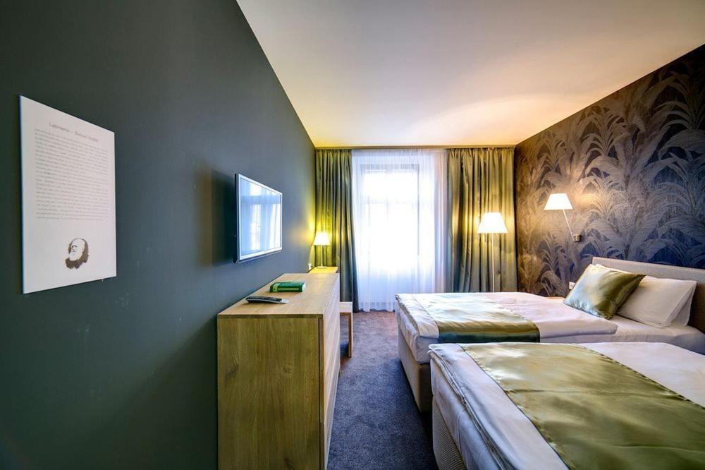 Hotel Restaurant Darwin Prag Værelse billede